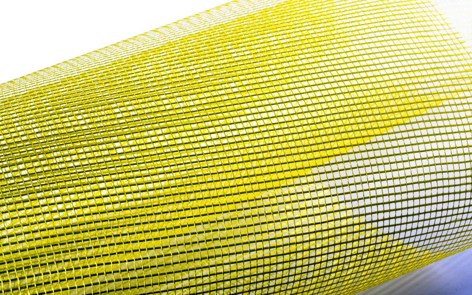 Roll of yellow alkali-resistant fibreglass reinforcing mesh